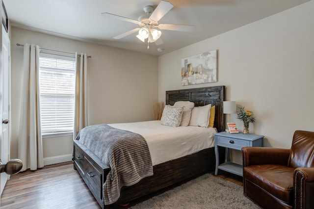 9207 Trenton Ave, Lubbock, TX 79424 - bedroom featuring light wood-style floors and a ceiling fan