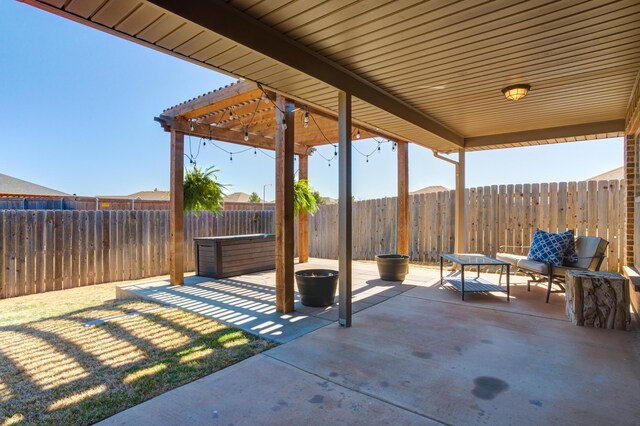 9207 Trenton Ave, Lubbock, TX 79424 - fenced backyard featuring a pergola and a patio