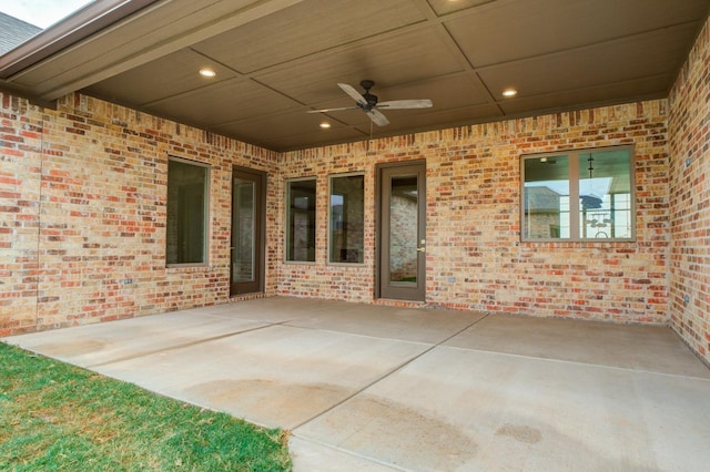 view of patio featuring ceiling fan