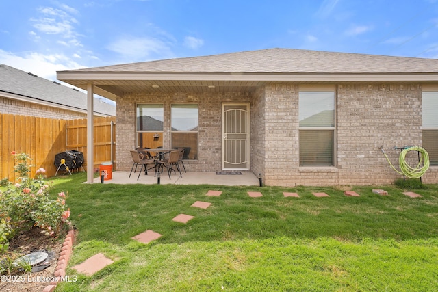 3222 Waverly Ave, Lubbock, TX 79407 - rear view of property with a patio area and brick siding