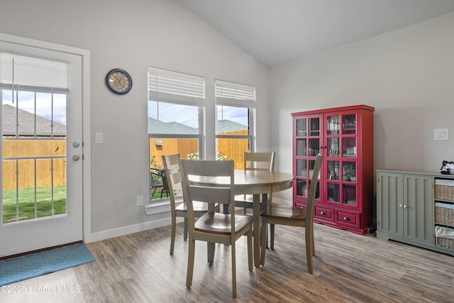 3222 Waverly Ave, Lubbock, TX 79407 - dining area featuring lofted ceiling and wood finished floors