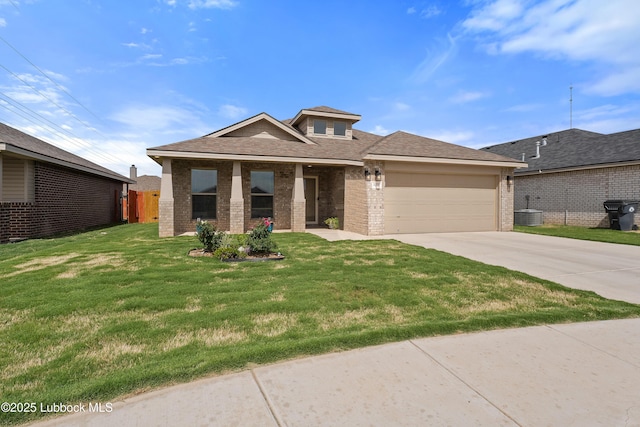 3222 Waverly Ave, Lubbock, TX 79407 - view of front facade featuring brick siding, concrete driveway, an attached garage, and a shingled roof