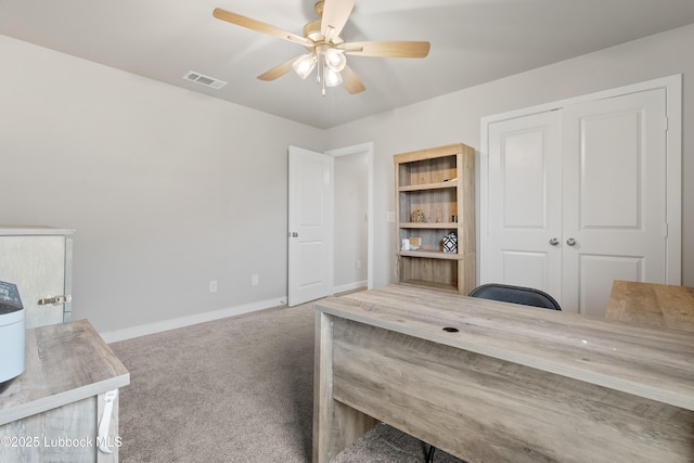 3222 Waverly Ave, Lubbock, TX 79407 - home office with a ceiling fan and carpet