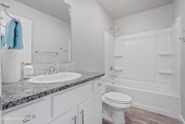 3222 Waverly Ave, Lubbock, TX 79407 - full bathroom featuring wood finished floors, vanity, and shower / bathtub combination