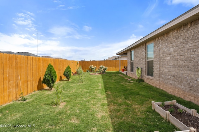 3222 Waverly Ave, Lubbock, TX 79407 - fenced backyard with a garden