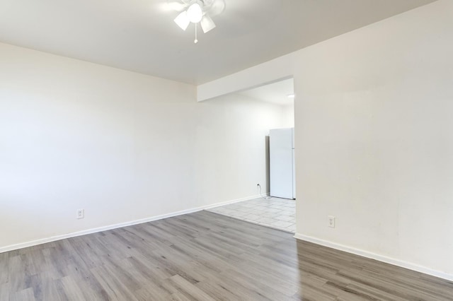 unfurnished room featuring light wood-type flooring