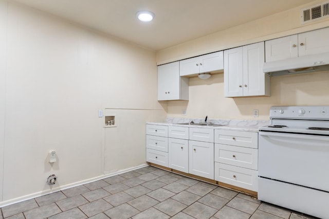 kitchen with sink, light tile patterned floors, white range with electric stovetop, light stone countertops, and white cabinets