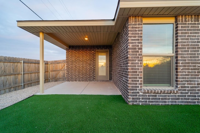 doorway to property featuring a patio