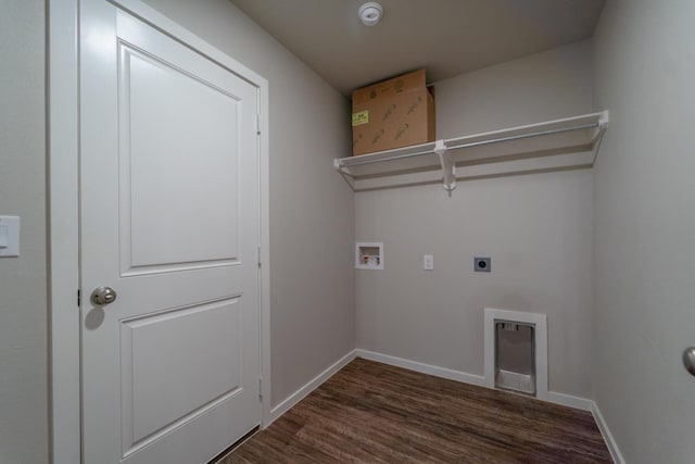 washroom with electric dryer hookup, hookup for a washing machine, and dark wood-type flooring