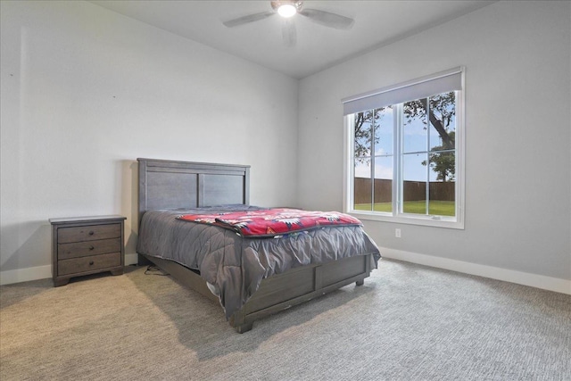 bedroom with ceiling fan and light carpet