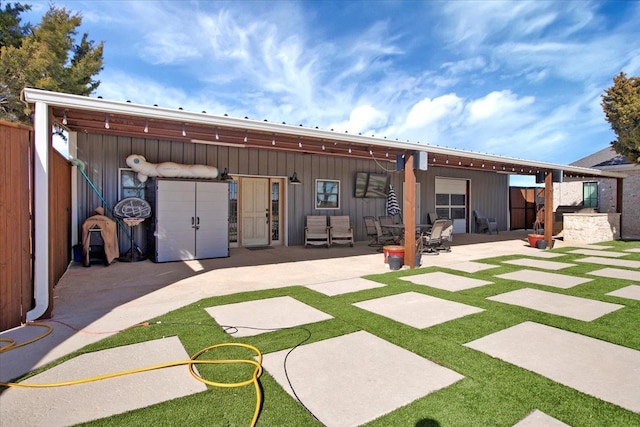 rear view of house with a patio area