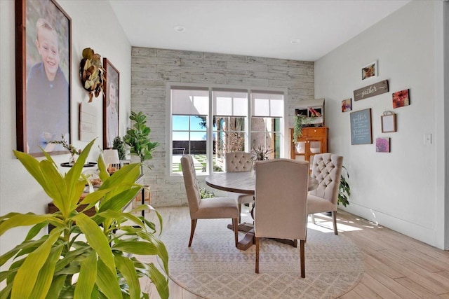 dining room featuring light hardwood / wood-style flooring