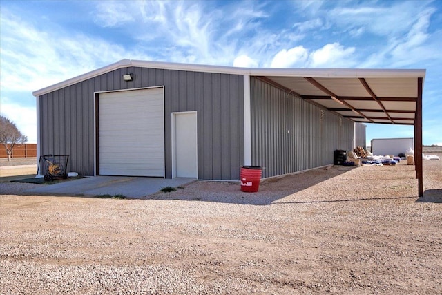 view of outdoor structure with a garage