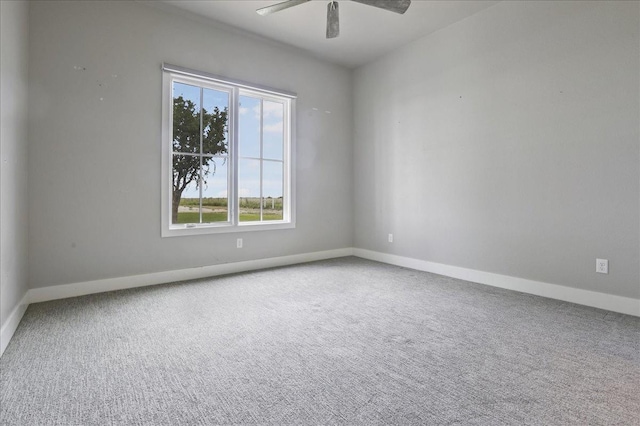 empty room with carpet floors and ceiling fan