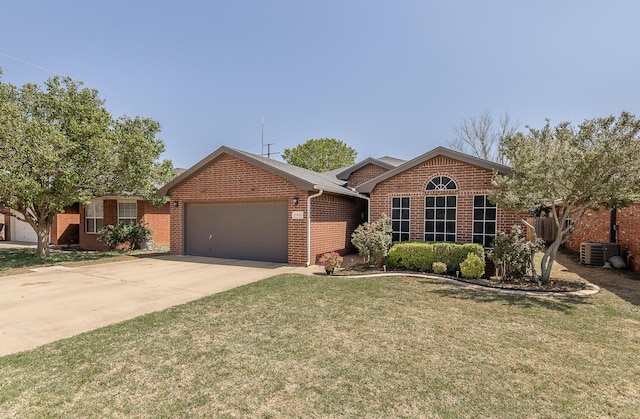 10609 Elkridge Ave, Lubbock, TX 79423 - ranch-style house featuring brick siding, an attached garage, concrete driveway, and a front yard