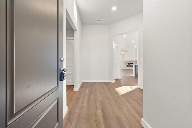 hallway featuring light hardwood / wood-style floors