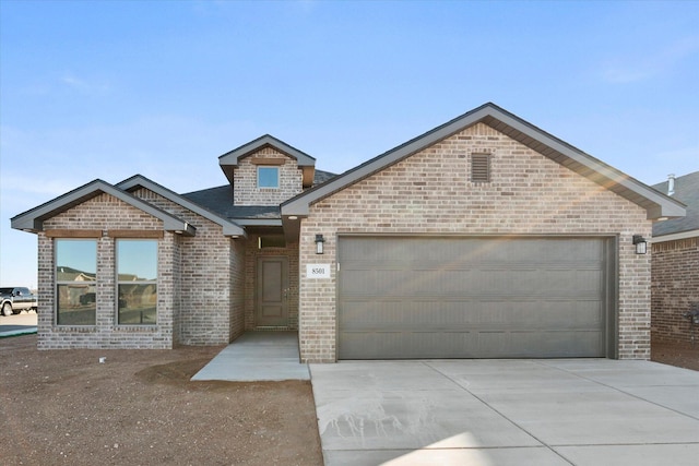 view of front of property featuring a garage