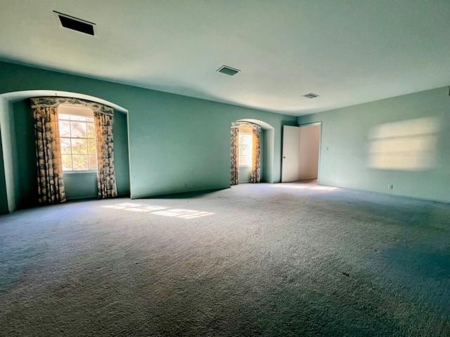 unfurnished room with carpet floors