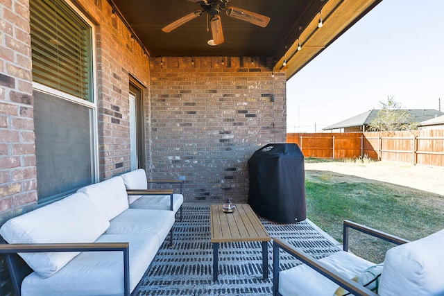 view of patio with outdoor lounge area, a grill, and ceiling fan