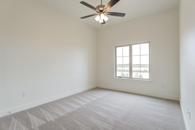 7615 52nd St, Lubbock, TX 79407 - unfurnished room with light carpet, baseboards, and a ceiling fan