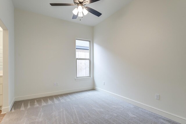 7615 52nd St, Lubbock, TX 79407 - unfurnished room featuring a ceiling fan, light colored carpet, and baseboards