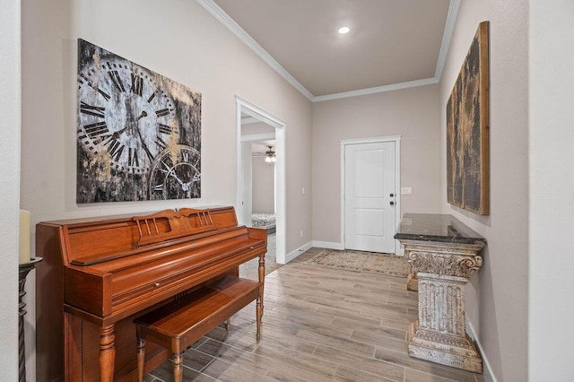 misc room with hardwood / wood-style flooring and ornamental molding