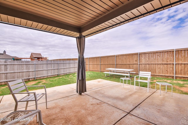2933 Abbeville Ave, Wolfforth, TX 79382 - fenced backyard featuring a patio