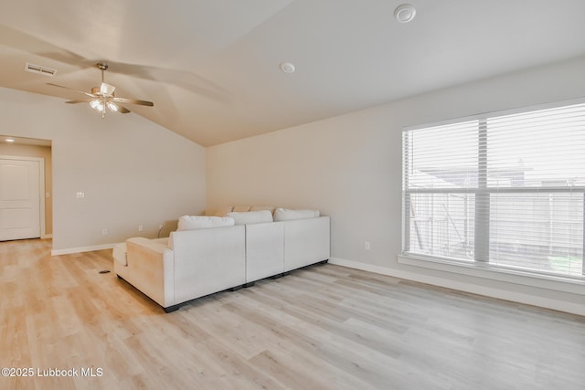 2933 Abbeville Ave, Wolfforth, TX 79382 - living room with vaulted ceiling, ceiling fan, and light wood finished floors