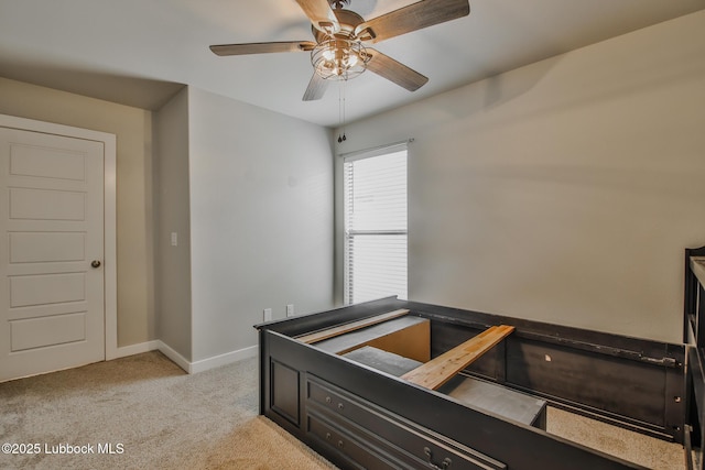 2933 Abbeville Ave, Wolfforth, TX 79382 - bedroom featuring light colored carpet and ceiling fan