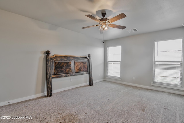 2933 Abbeville Ave, Wolfforth, TX 79382 - spare room with carpet flooring and a ceiling fan