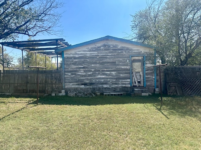 view of property exterior featuring a lawn