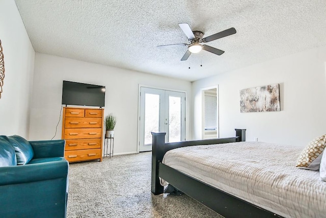 carpeted bedroom featuring ceiling fan, access to outside, french doors, and a textured ceiling