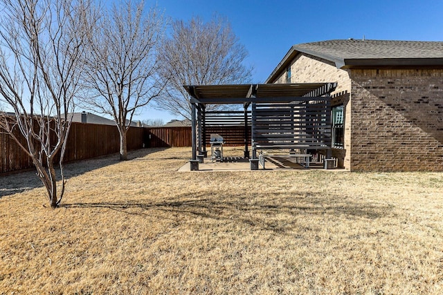 view of yard featuring a patio and a pergola