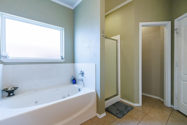 bathroom with independent shower and bath, crown molding, and tile patterned floors