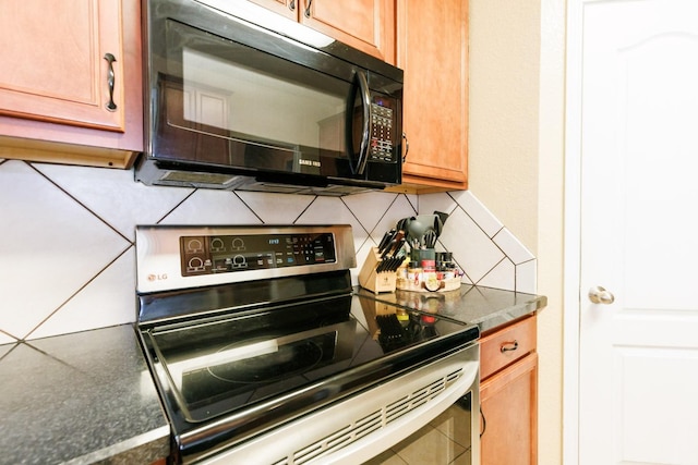 kitchen featuring decorative backsplash and stainless steel electric range