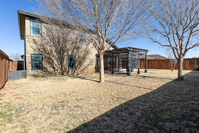 rear view of house with a pergola