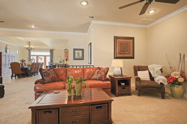 carpeted living room featuring ornamental molding and ceiling fan with notable chandelier