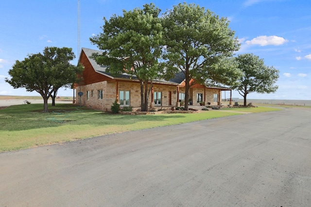 view of front of home with a front lawn