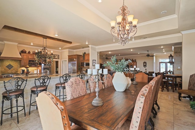 dining area with light tile patterned floors, ceiling fan with notable chandelier, ornamental molding, and a raised ceiling