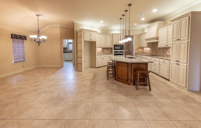 3909 101st St, Lubbock, TX 79423 - kitchen with decorative backsplash, custom exhaust hood, a chandelier, a sink, and black appliances