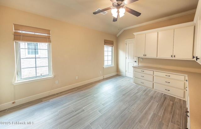 3909 101st St, Lubbock, TX 79423 - unfurnished bedroom featuring visible vents, ornamental molding, baseboards, ceiling fan, and light wood finished floors