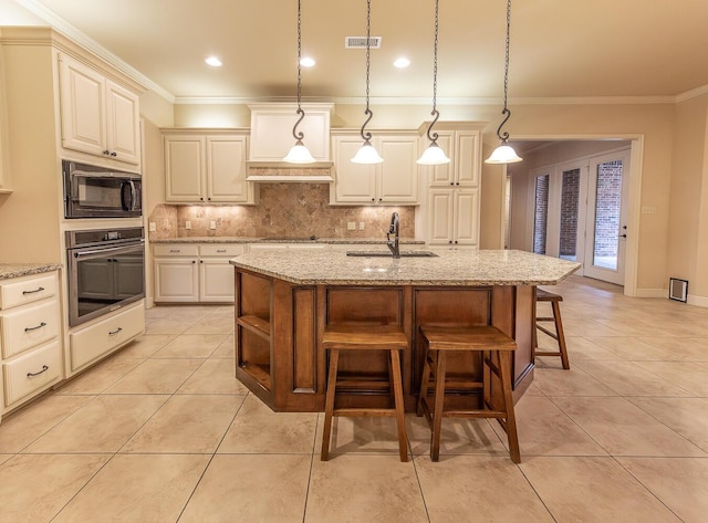 3909 101st St, Lubbock, TX 79423 - kitchen featuring crown molding, stainless steel oven, a sink, and black microwave
