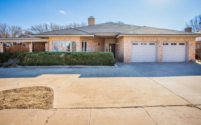 view of front of property featuring a garage