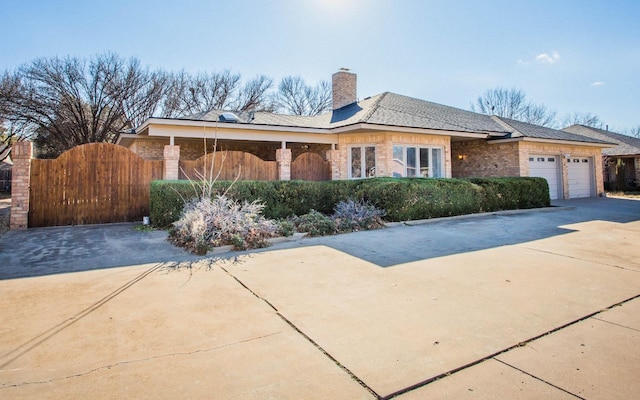 view of front of home with a garage