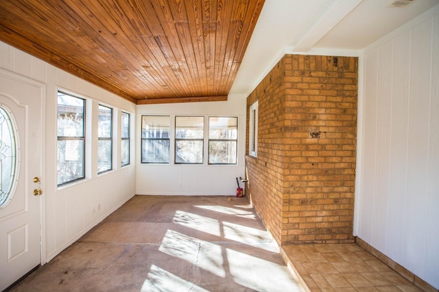 unfurnished sunroom with plenty of natural light and wooden ceiling