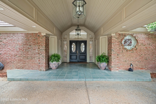 5118 2nd St, Lubbock, TX 79416 - doorway to property featuring brick siding