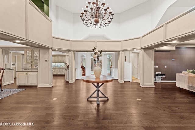 5118 2nd St, Lubbock, TX 79416 - entrance foyer featuring a chandelier, a high ceiling, and dark wood finished floors