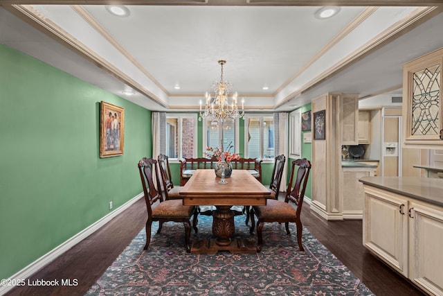 5118 2nd St, Lubbock, TX 79416 - dining space featuring a chandelier, a tray ceiling, ornamental molding, dark wood finished floors, and recessed lighting