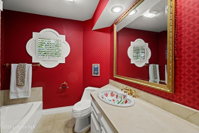 5118 2nd St, Lubbock, TX 79416 - bathroom with a bath, vanity, wallpapered walls, and tile patterned flooring