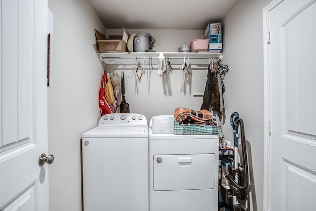 washroom with washer and dryer